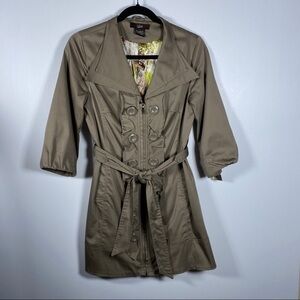 LUII Women’s coat. Ruffles and buttons up the front. Zips closed. 3/4 sleeves. S